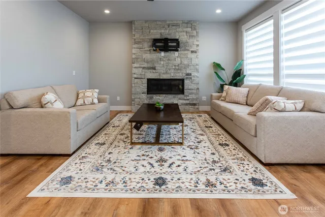 a large kitchen with a table and chairs