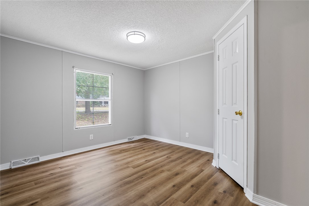 120 Old Brickyard Road Pelzer, SC 29669 - Photo 15 of 27 Bedroom 2 with LVP flooring