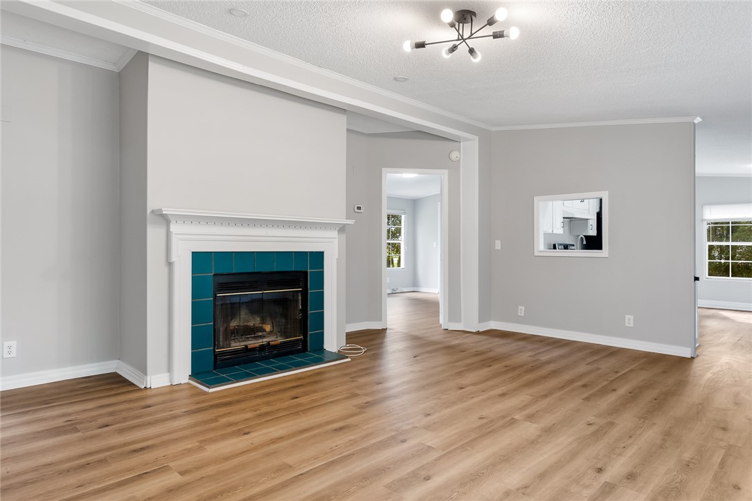 120 Old Brickyard Road Pelzer, SC 29669 - Photo 3 of 27 Living room with wood burning fireplace.