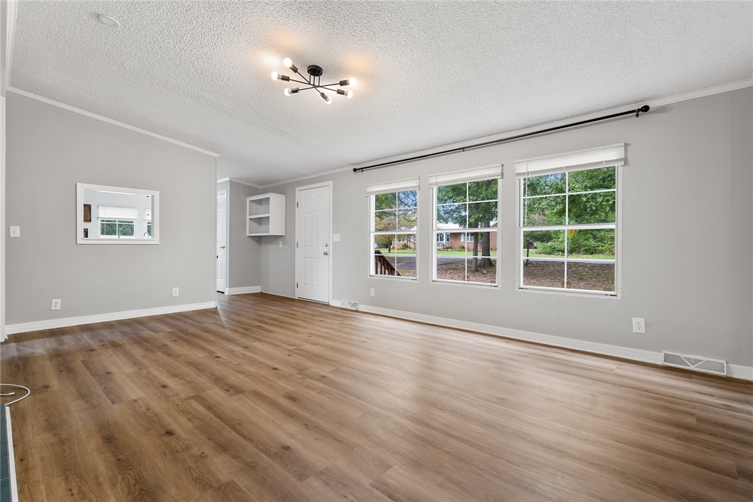 120 Old Brickyard Road Pelzer, SC 29669 - Photo 4 of 27 Living room with new LVP flooring.