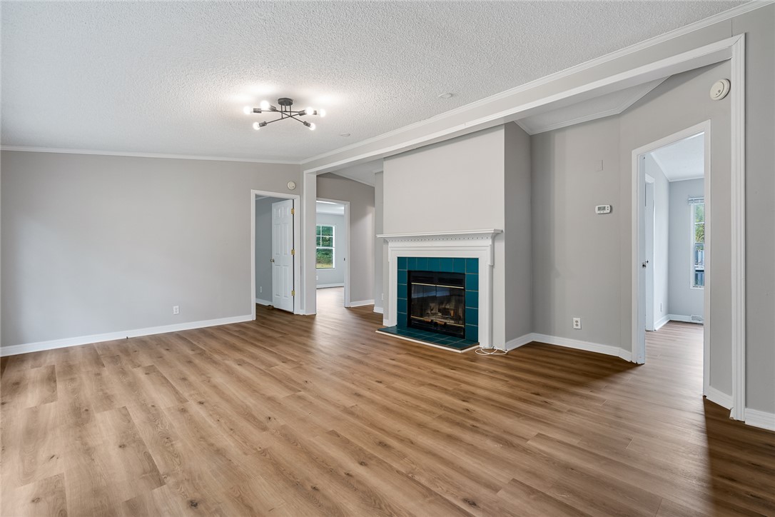 120 Old Brickyard Road Pelzer, SC 29669 - Photo 5 of 27 Spacious living areas with updated light fixtures.