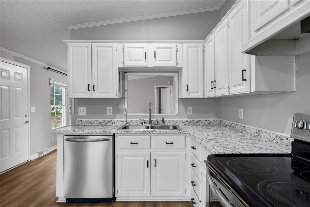 120 Old Brickyard Road Pelzer, SC 29669 - Photo 8 of 27 Crisp white cabinets.