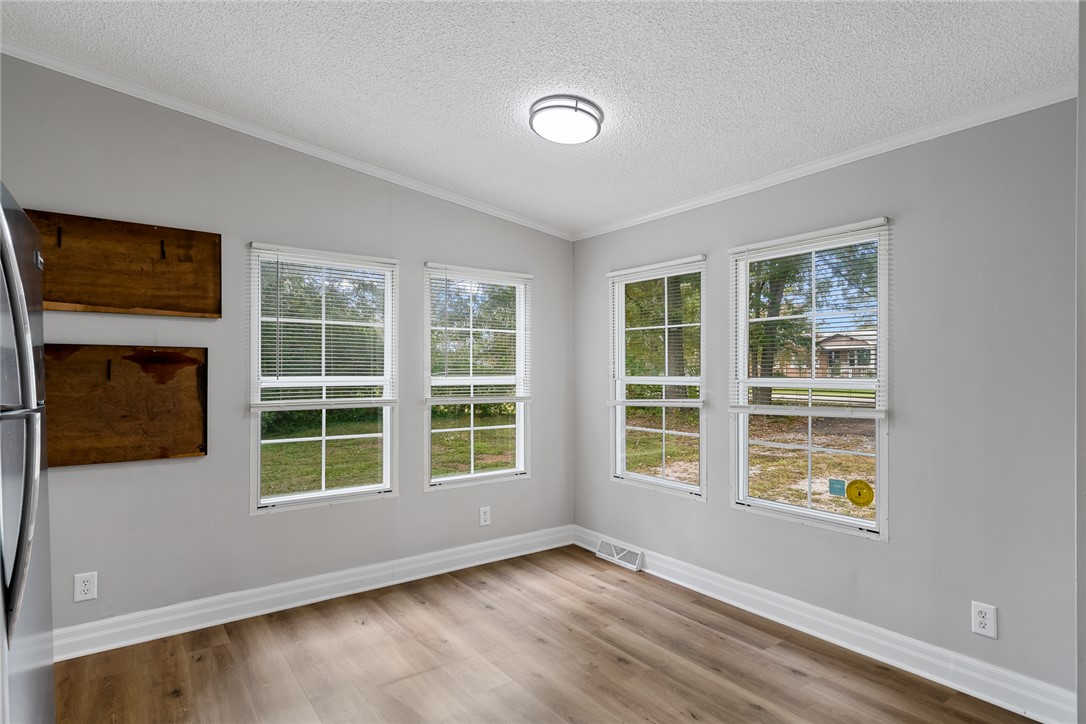 120 Old Brickyard Road Pelzer, SC 29669 - Photo 10 of 27 Dining Room with natural light.