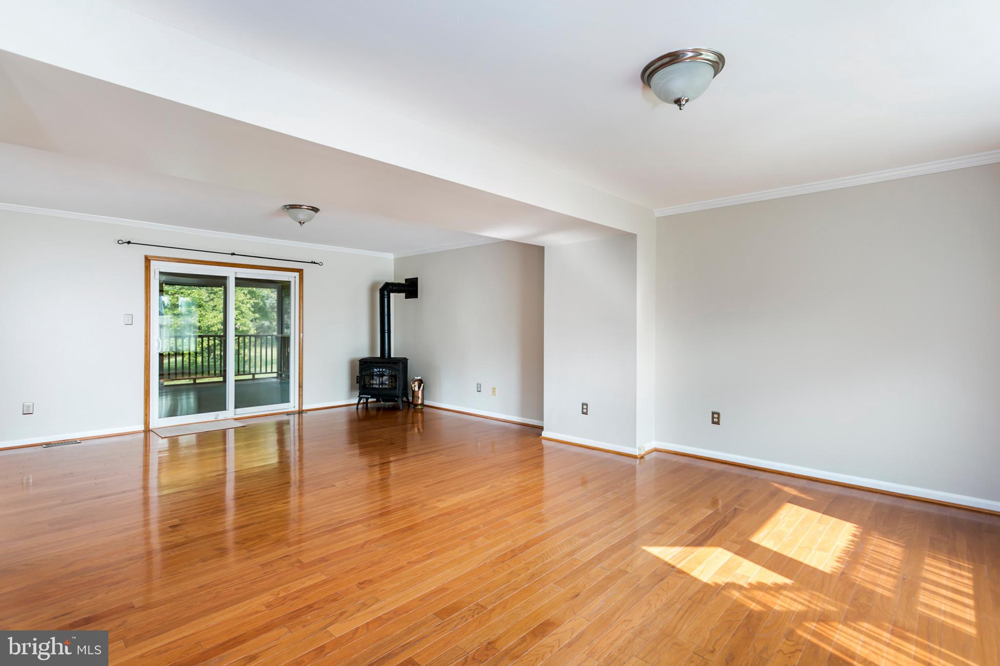 6300 Homewood Road Linthicum, MD 21090 - Photo 4 of 46 Large living room with gas stove.