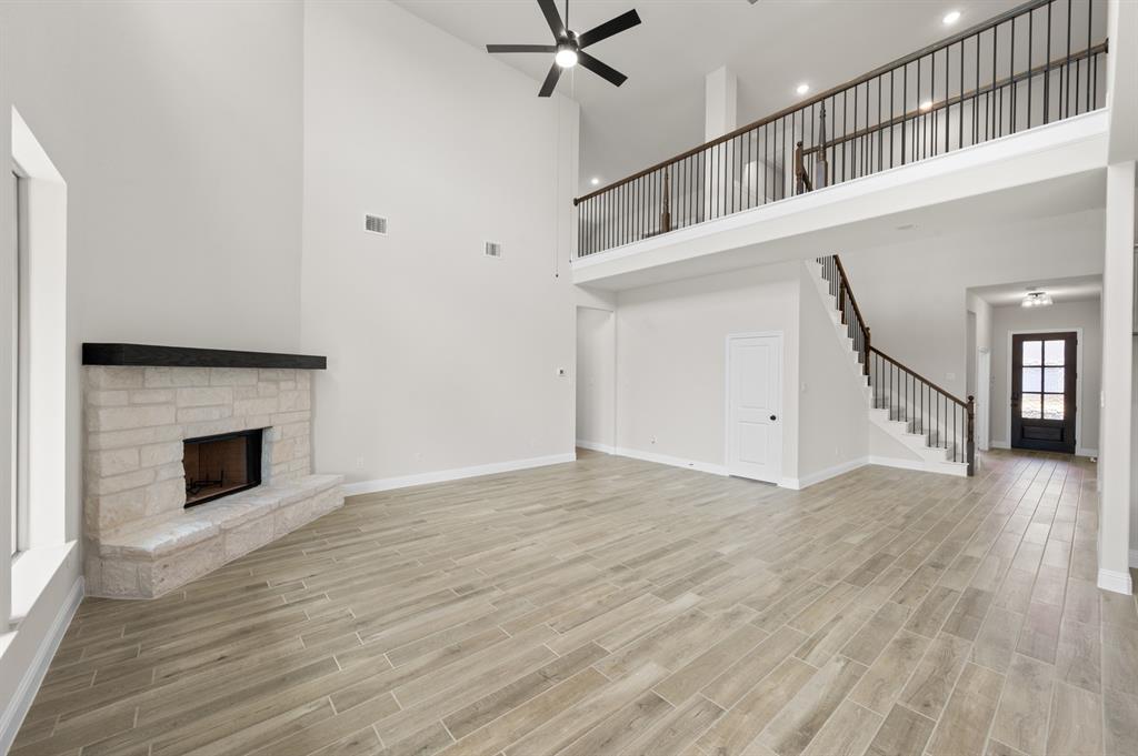 705 Seahawk Street Joshua, TX 76058 - Photo 10 of 28 DFW-Mockingbird Hills-Concept 3473-705 Seahawk Street-Living Room-Risewell Homes-1