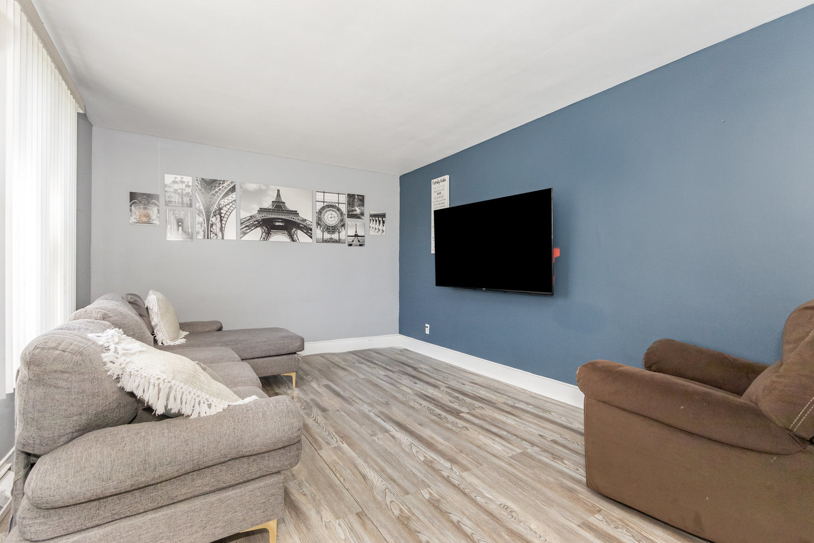 17518 Roy Street Lansing, IL 60438 - Photo 3 of 17 a living room with furniture and a flat screen tv