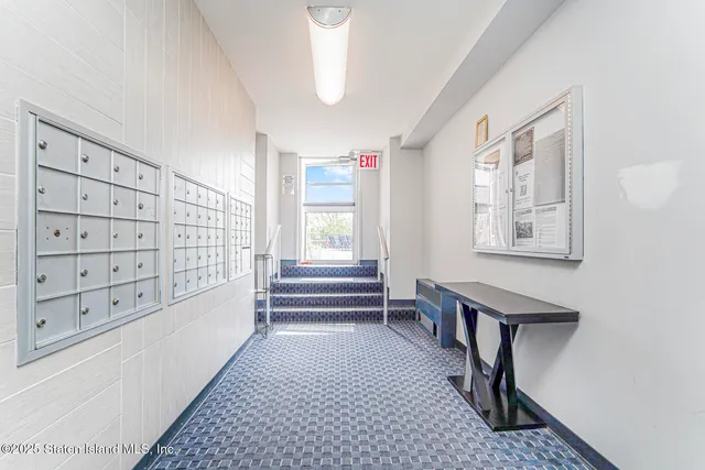 a view of entryway with stairs and furniture