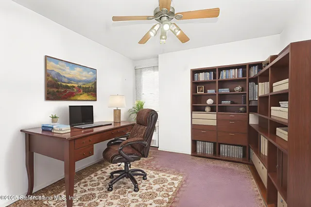 a view of a livingroom with furniture and a couch