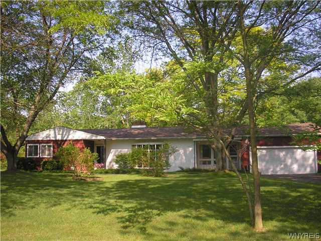 3975 Day Road Newfane, NY 14094 - Photo 1 of 1 Exterior Front Set back off the road and framed wi