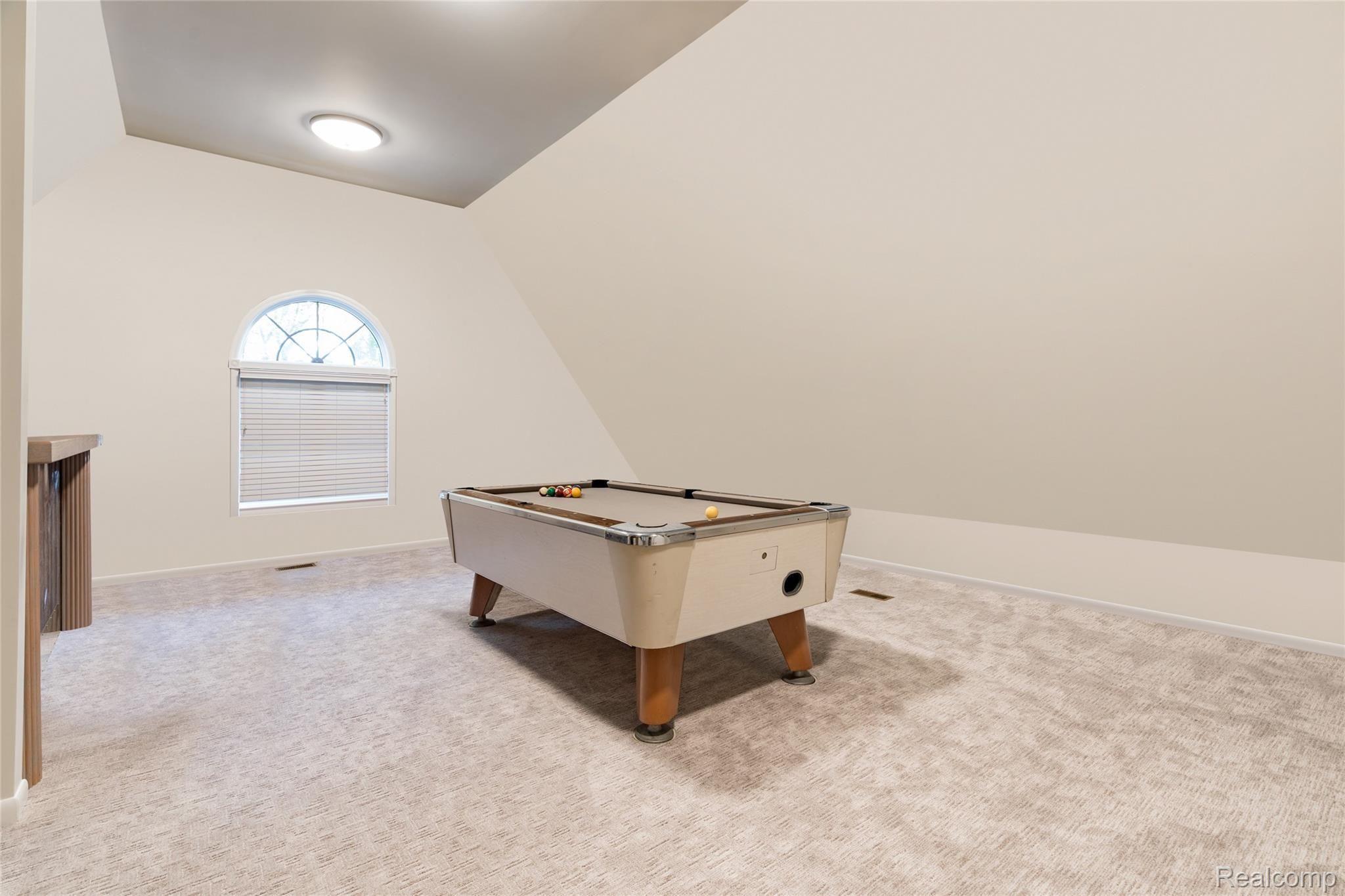 10081 Gibbs Road Clarkston, MI 48348 - Photo 28 of 57 Virtually Staged 2nd Floor Rec Room or Trophy Room w/ Wet Bar