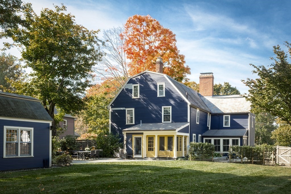 88 County Road Ipswich, MA 01938 - Photo 31 of 40 a front view of a house with a garden