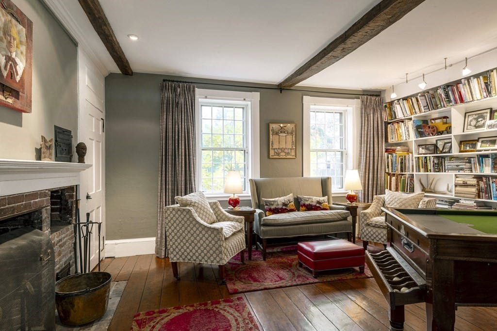 88 County Road Ipswich, MA 01938 - Photo 5 of 40 a living room with furniture and a fireplace