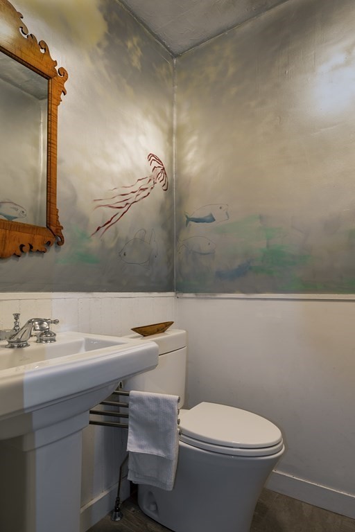 88 County Road Ipswich, MA 01938 - Photo 7 of 40 a bathroom with a sink mirror and toilet
