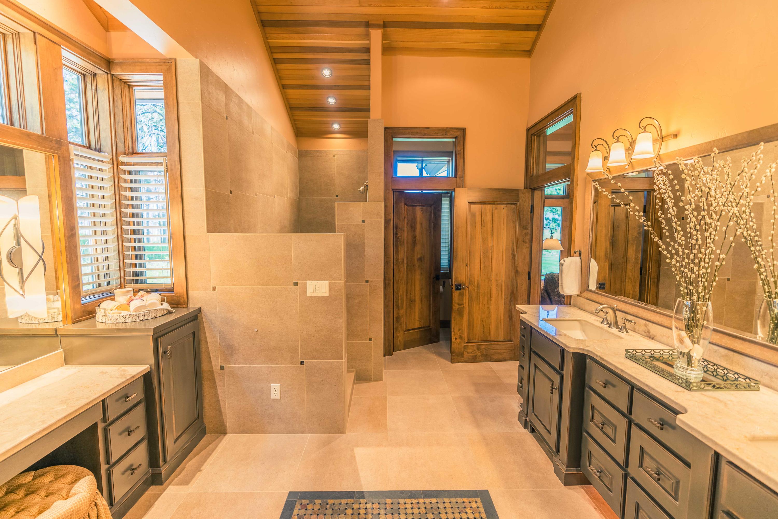 13778 Bishops Cap, Unit EM 8 Black Butte Ranch, OR 97759 - Photo 10 of 27 Beautiful marble counter tops, custom cabinets and heated floors.