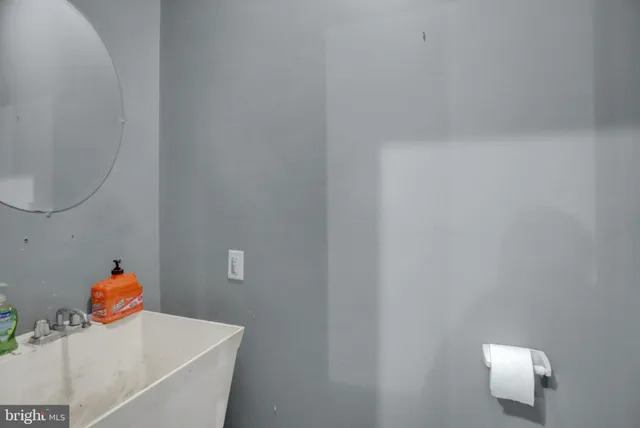 a bathroom with a sink and a toilet