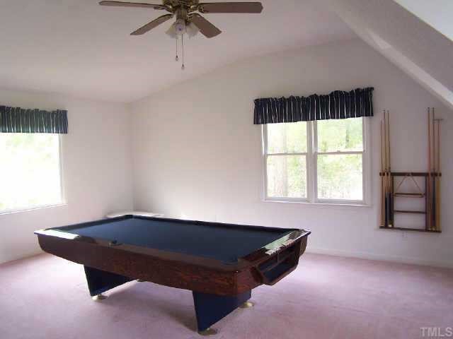 5321 Ridgeloch Place Raleigh, NC 27612 - Photo 8 of 10 an empty room with windows and ceiling fan