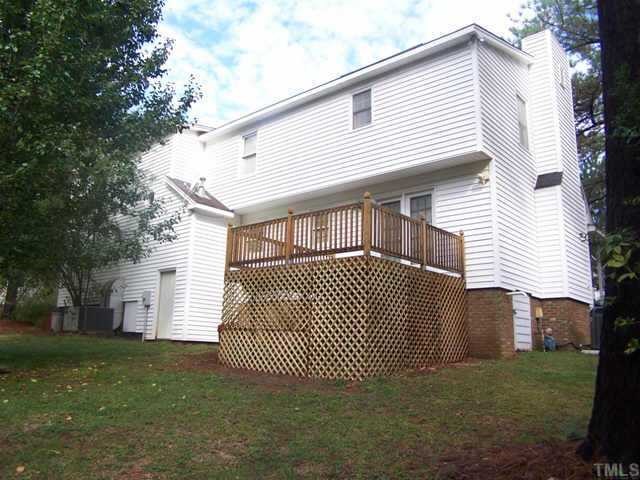 5321 Ridgeloch Place Raleigh, NC 27612 - Photo 10 of 10 a front view of a house with a garden