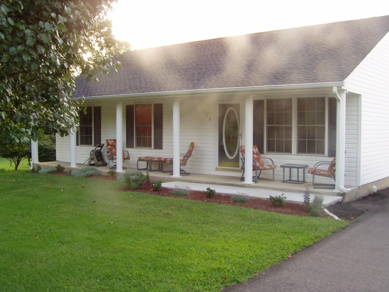 1122 Mountain View Road Vinton, VA 24179 - Photo 2 of 20 front view of a house with a yard