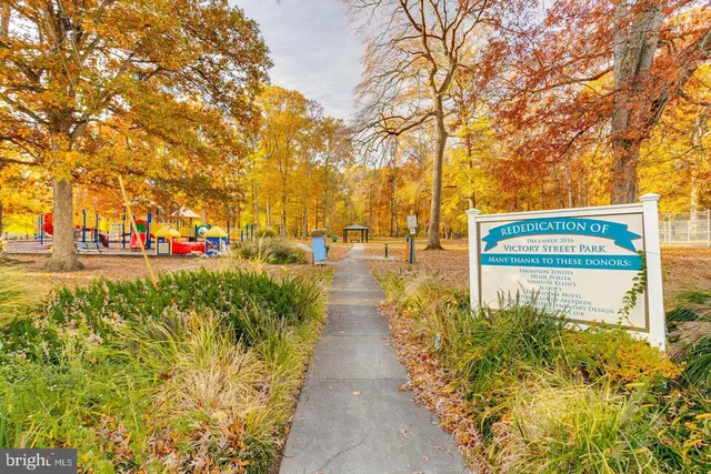 a view of pathway with a yard