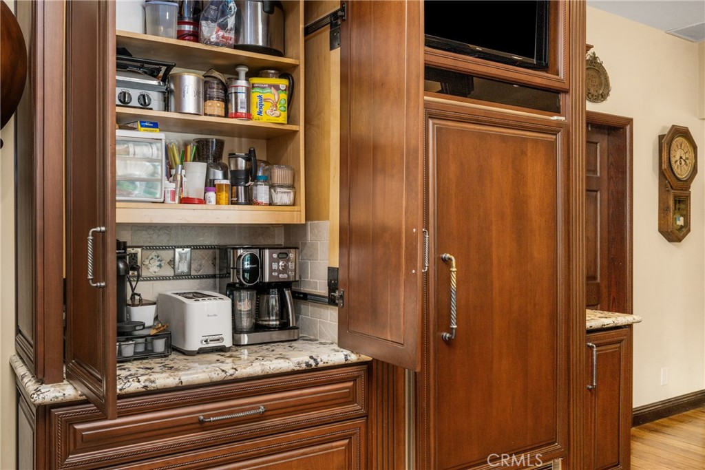 6071 Sun View Road Yorba Linda, CA 92886 - Photo 17 of 65 Coffee cabinet and Sub Zero refrigerator