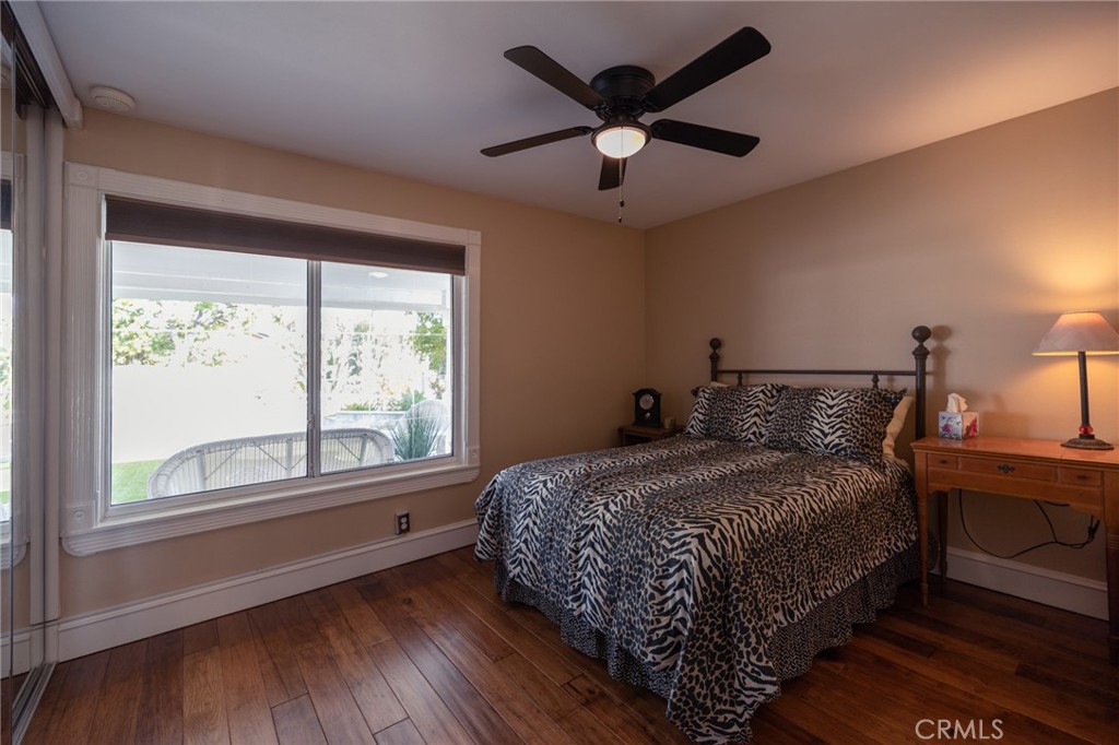 6071 Sun View Road Yorba Linda, CA 92886 - Photo 21 of 49 a bedroom with a large bed and a large window