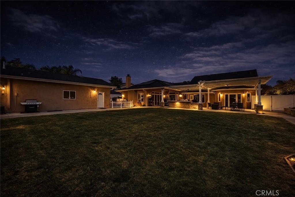 6071 Sun View Road Yorba Linda, CA 92886 - Photo 27 of 49 a front view of a house with a garden