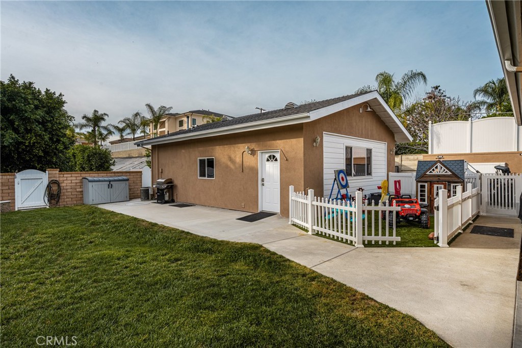 6071 Sun View Road Yorba Linda, CA 92886 - Photo 32 of 49 a view of a house with porch and furniture