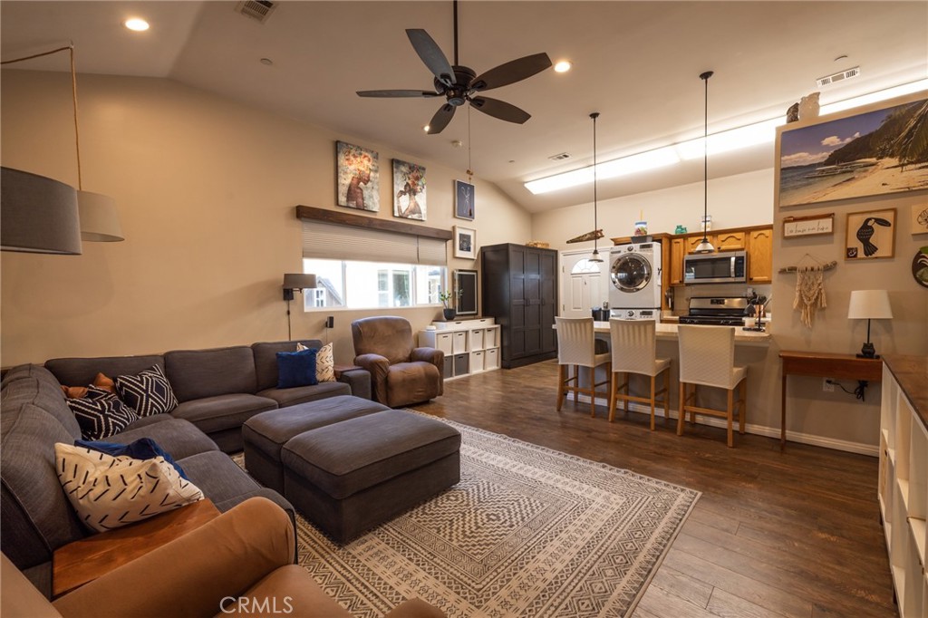 6071 Sun View Road Yorba Linda, CA 92886 - Photo 37 of 49 a living room with furniture kitchen view and a chandelier