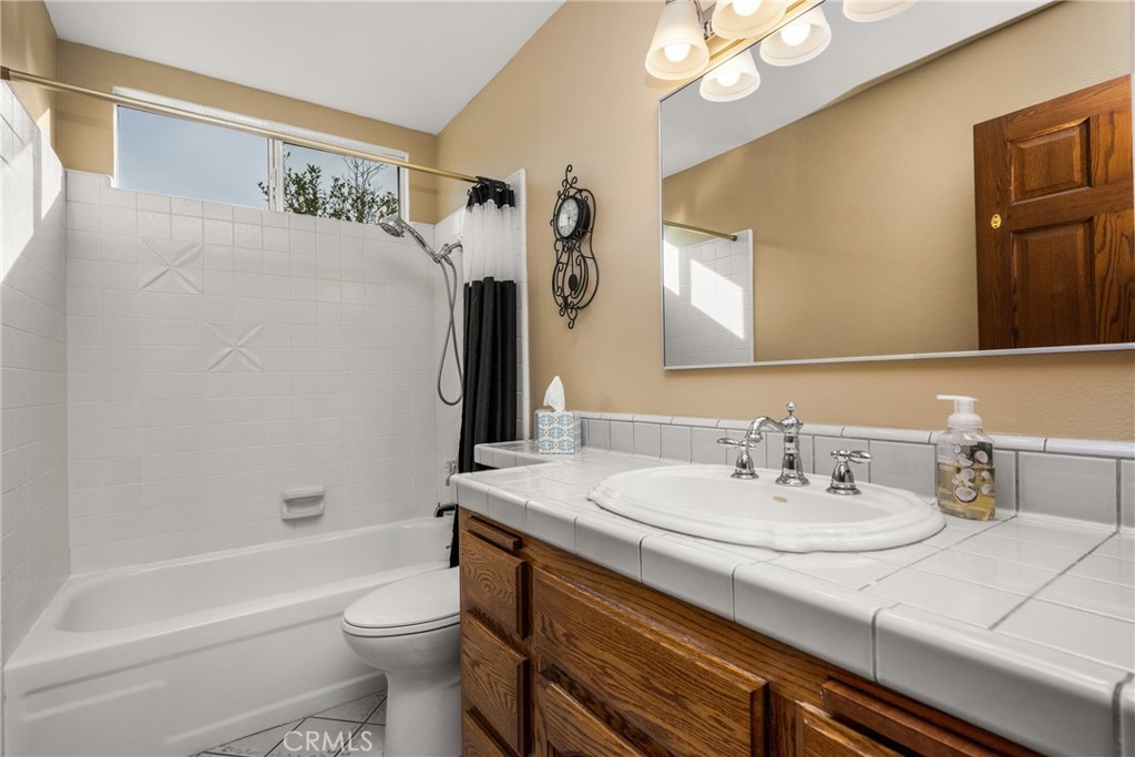 6071 Sun View Road Yorba Linda, CA 92886 - Photo 39 of 65 Hall bath with a tub downstairs