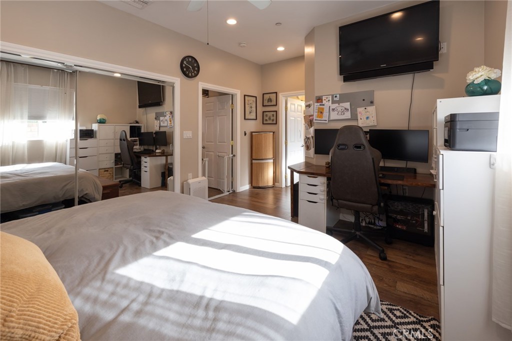 6071 Sun View Road Yorba Linda, CA 92886 - Photo 41 of 49 a bed room with a bed a television and a chair