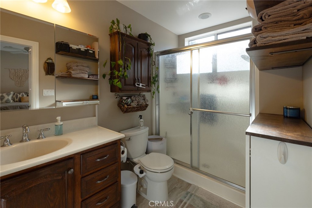 6071 Sun View Road Yorba Linda, CA 92886 - Photo 42 of 49 a bathroom with a sink a toilet and shower