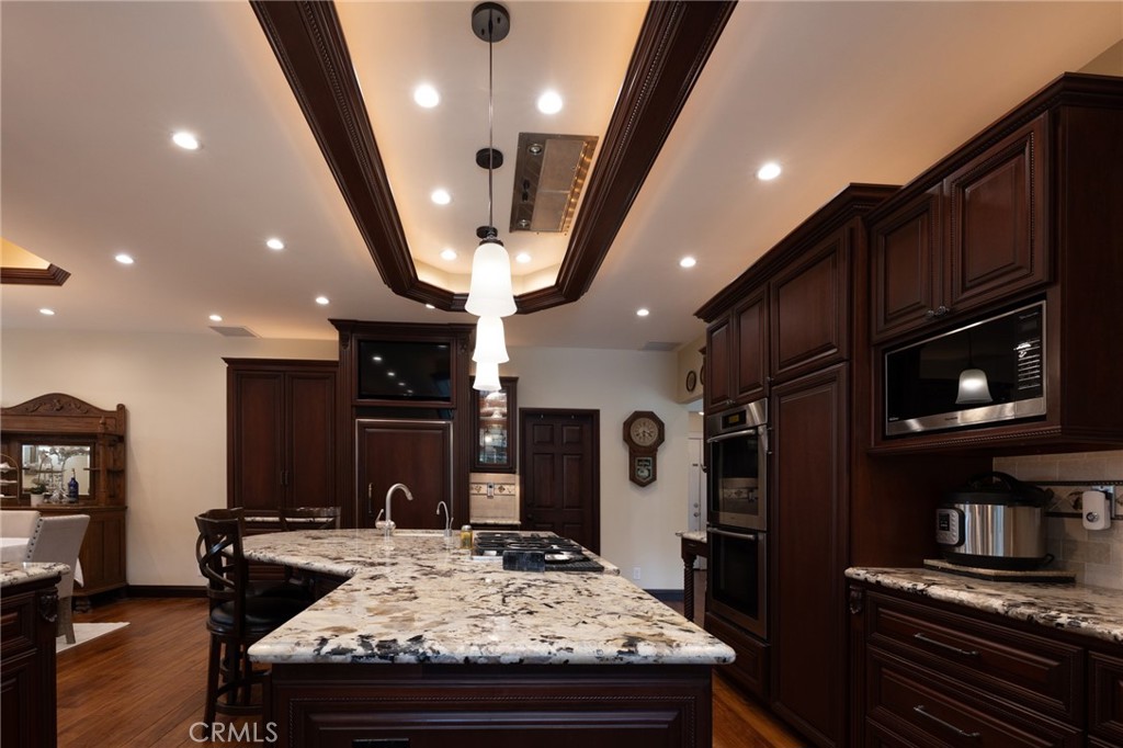 6071 Sun View Road Yorba Linda, CA 92886 - Photo 7 of 49 a kitchen with stove and refrigerator