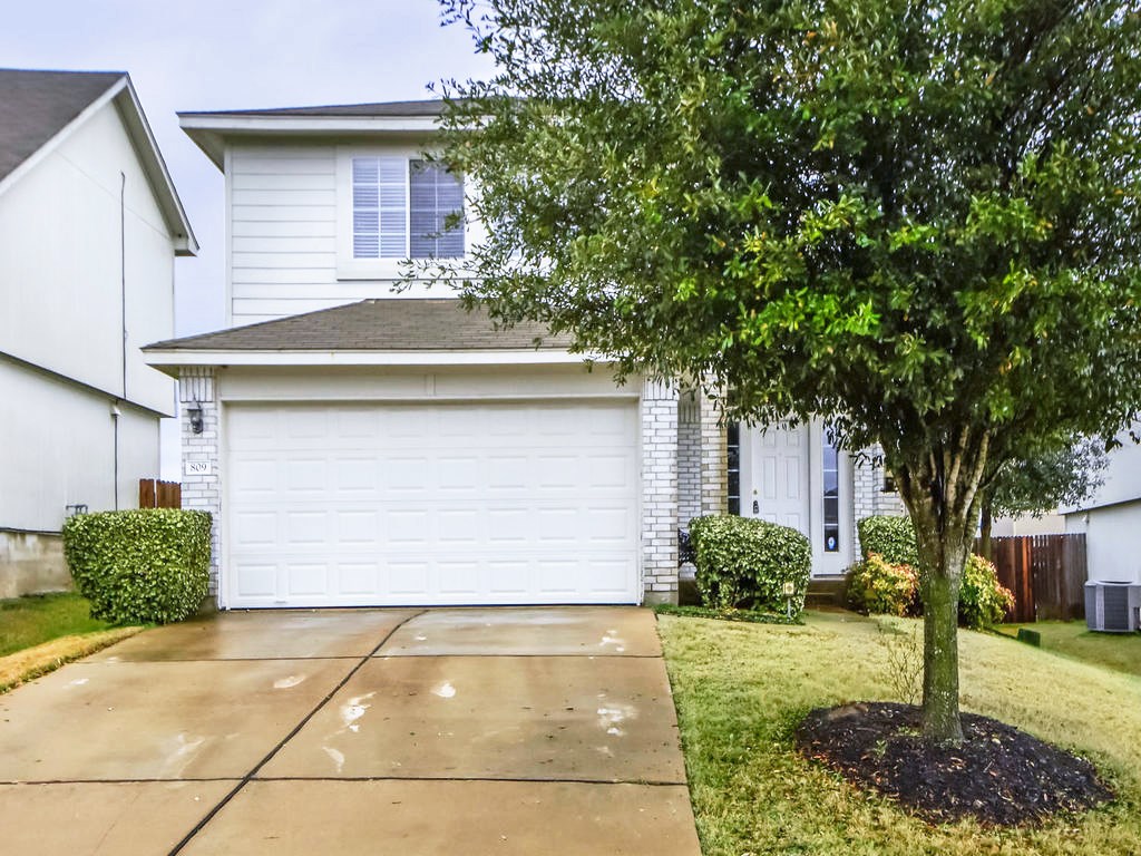 809 Flatters Way Pflugerville, TX 78660 - Photo 1 of 1 a house that has a tree in front of the house