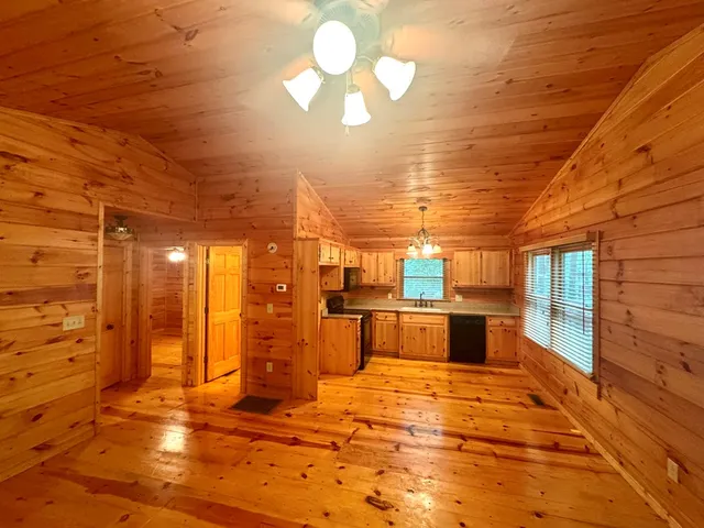 a view of empty room with windows