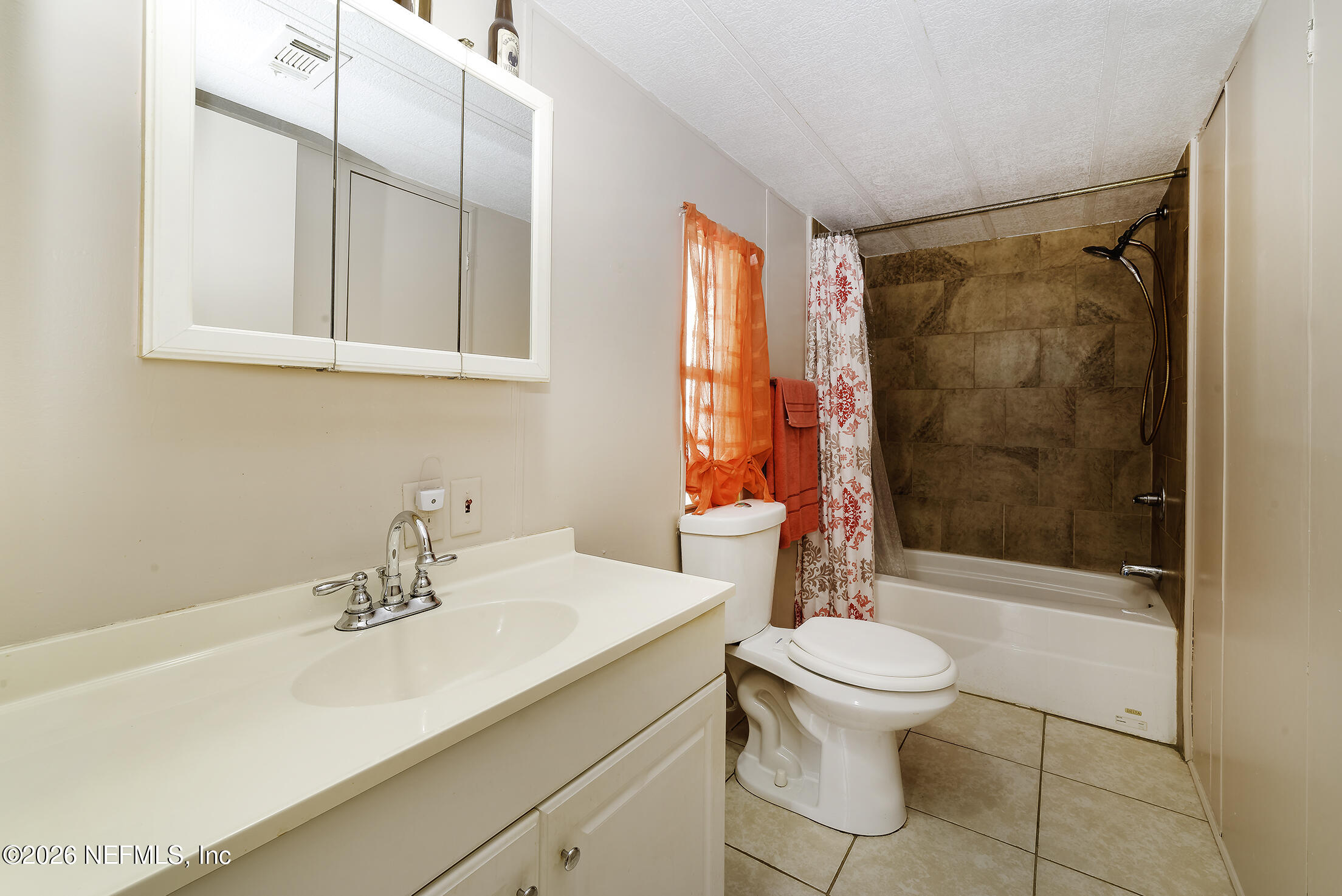 206 Dolphin Drive Georgetown, FL 32139 - Photo 25 of 27 a bathroom with a sink toilet and shower