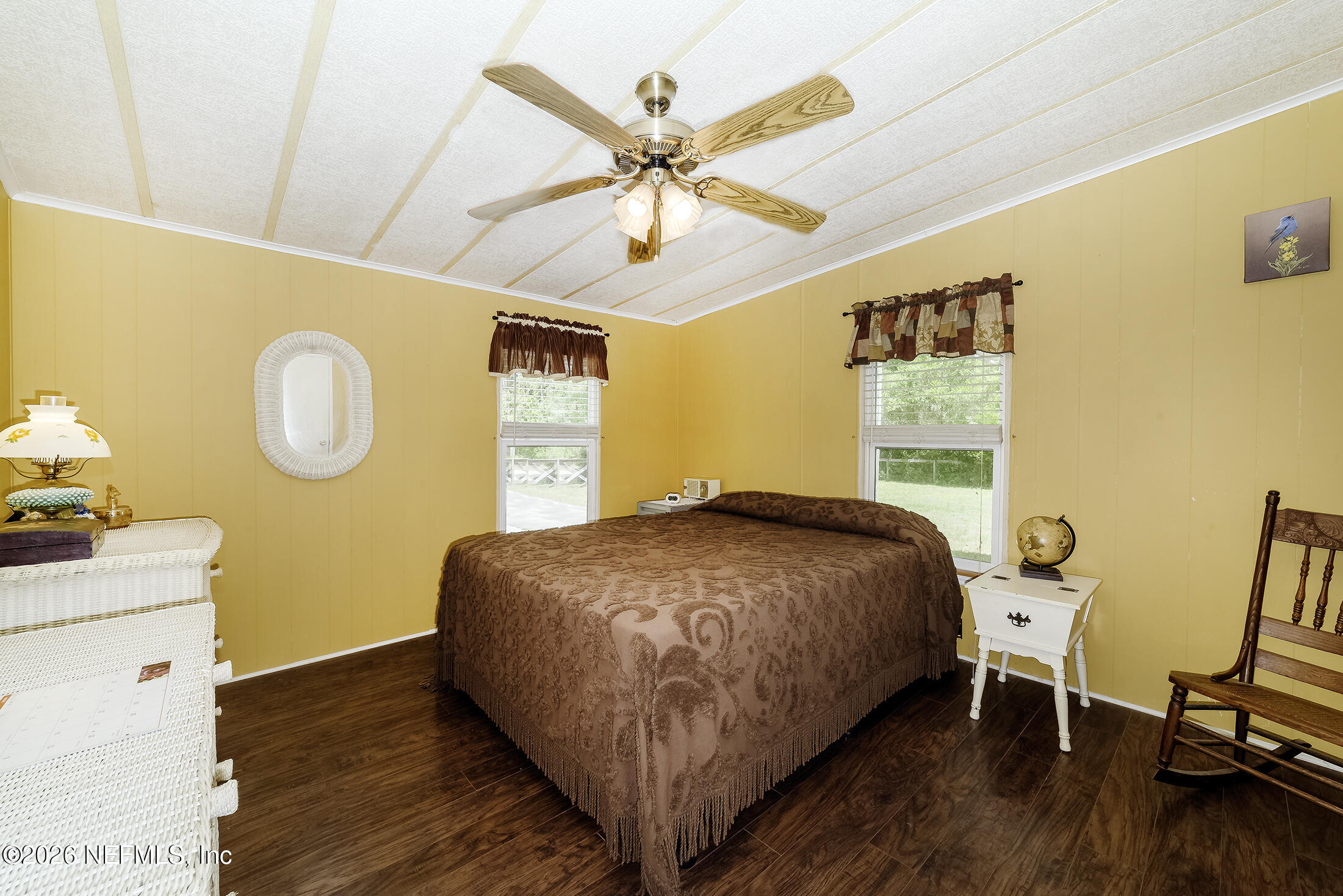 206 Dolphin Drive Georgetown, FL 32139 - Photo 26 of 27 a bed room with a bed and a window