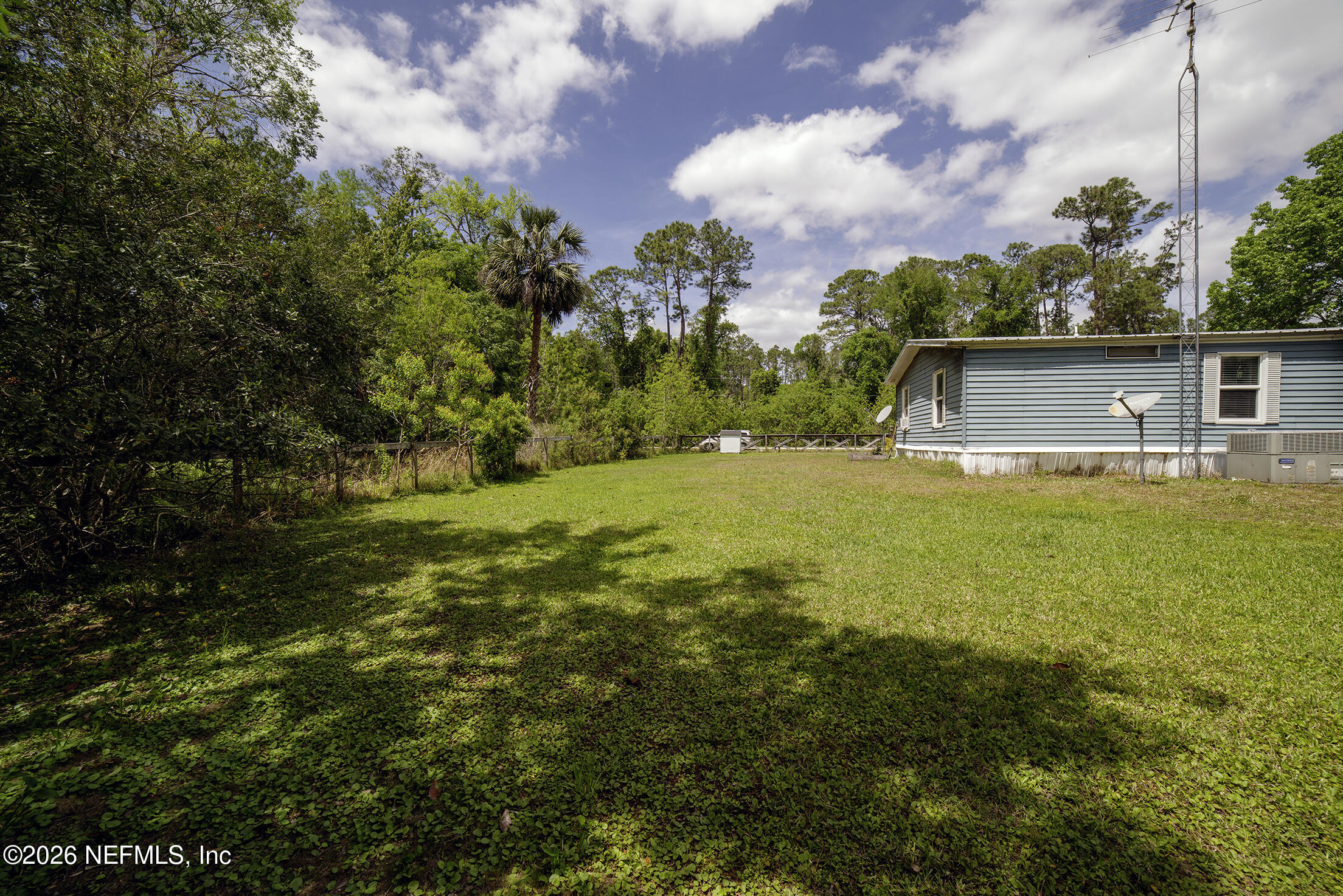 206 Dolphin Drive Georgetown, FL 32139 - Photo 4 of 27 a view of a house with a big yard