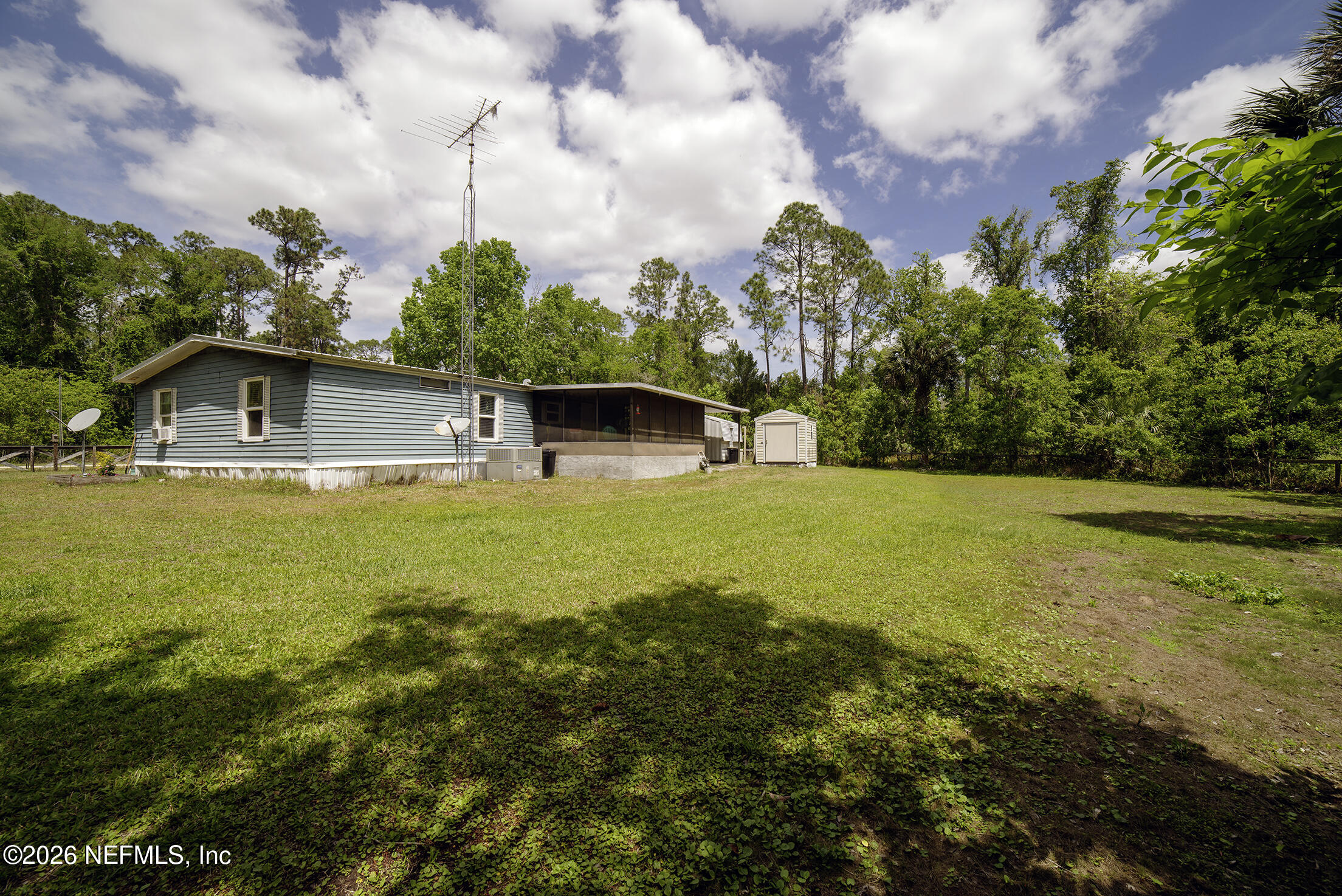 206 Dolphin Drive Georgetown, FL 32139 - Photo 5 of 27 a view of a house with a yard