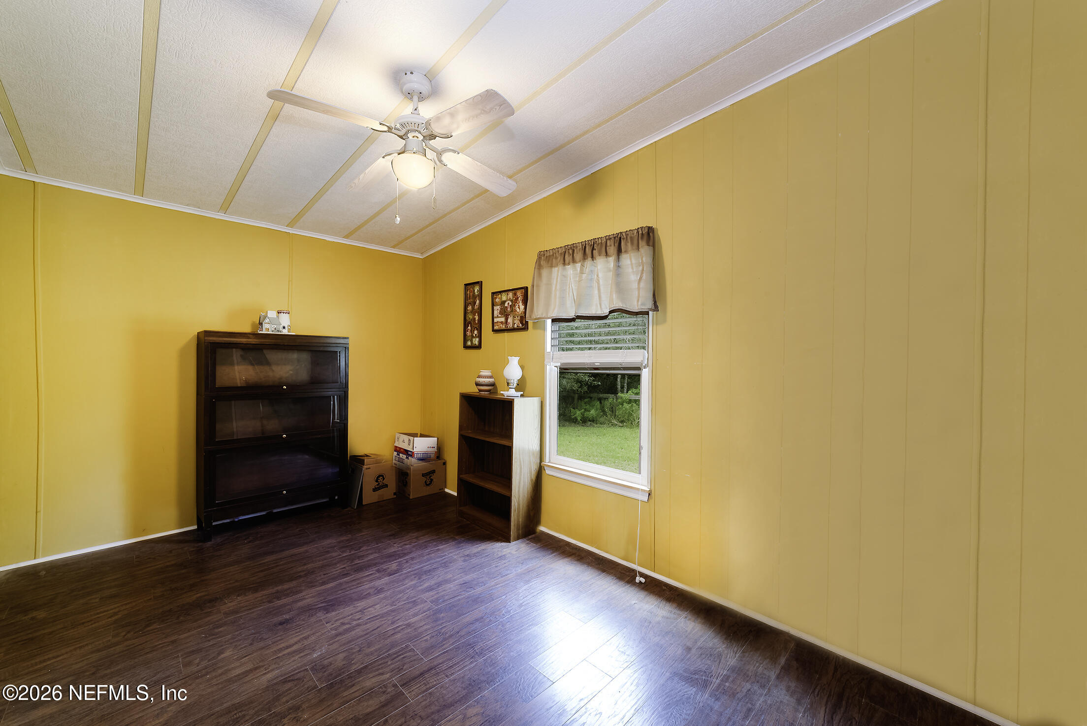 206 Dolphin Drive Georgetown, FL 32139 - Photo 9 of 27 a view of a livingroom with wooden floor