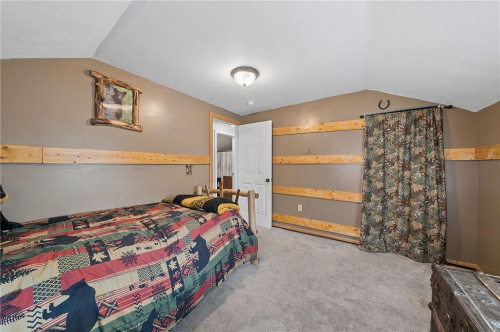 2106 Lindsay Road Pittsburgh, PA 15221 - Photo 21 of 36 The second bedroom also features original hardwood flooring under the carpet.