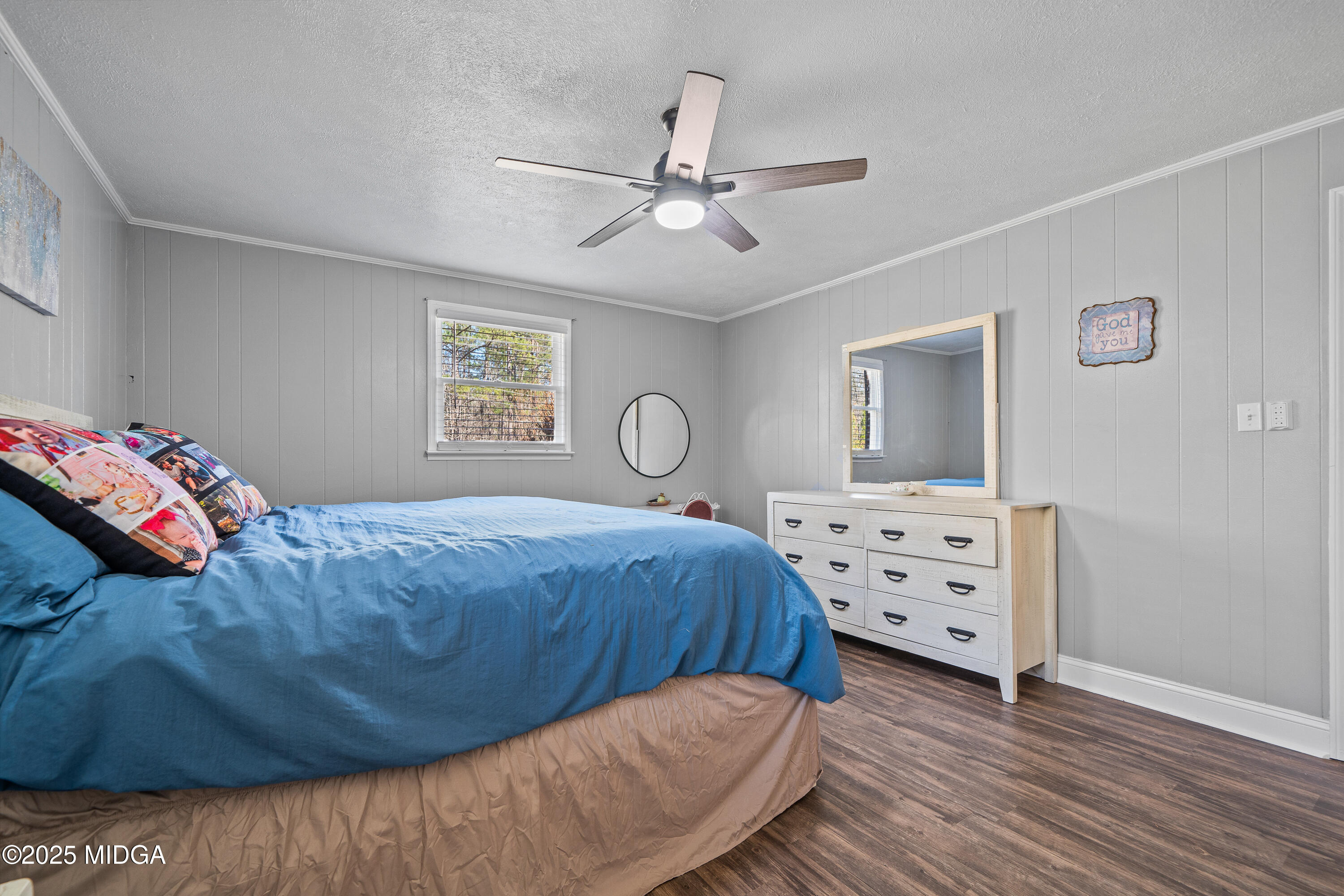 184 Camelot Road Gray, GA 31032 - Photo 24 of 38 a bedroom with a bed window and dresser