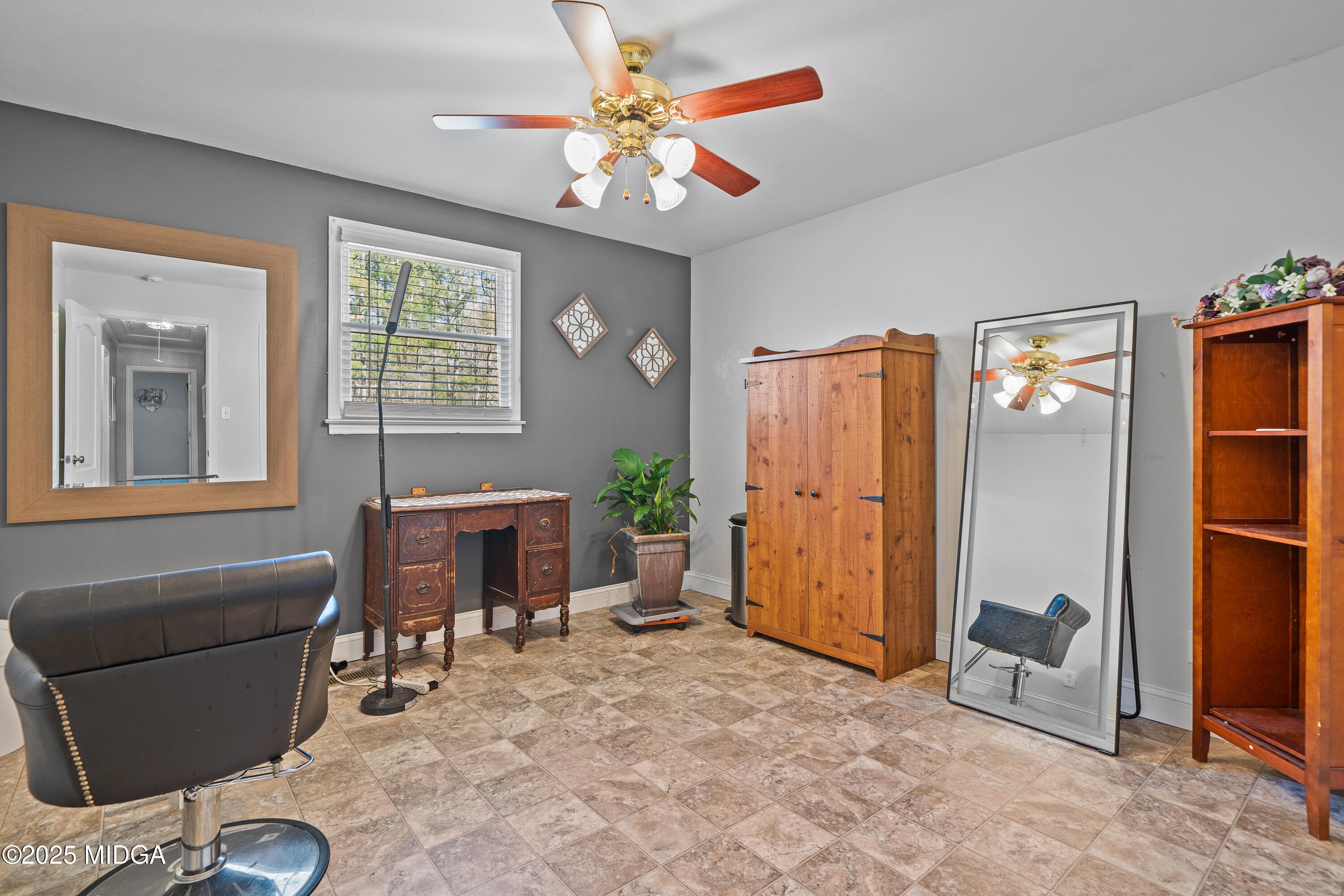 184 Camelot Road Gray, GA 31032 - Photo 25 of 38 a living room with furniture and a window