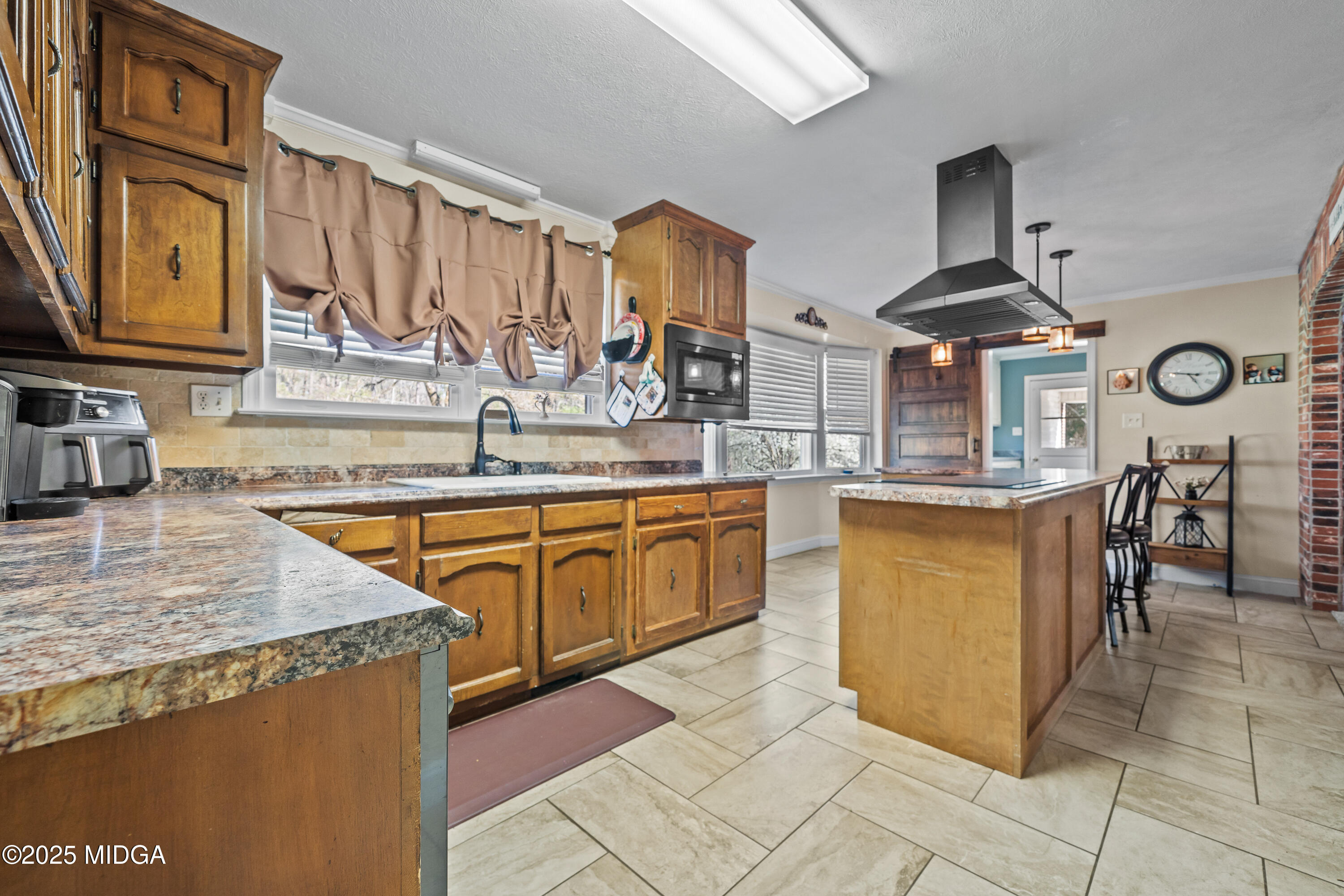 184 Camelot Road Gray, GA 31032 - Photo 8 of 38 a kitchen with stainless steel appliances granite countertop a sink and cabinets