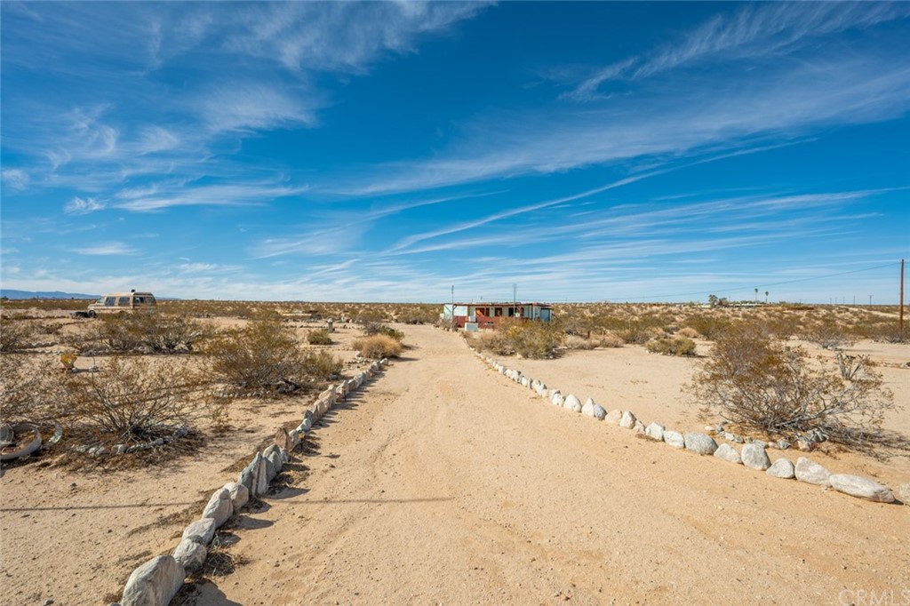 736 Copper Mountain Road Joshua Tree, CA 92252 - Photo 3 of 28 a view of an ocean beach