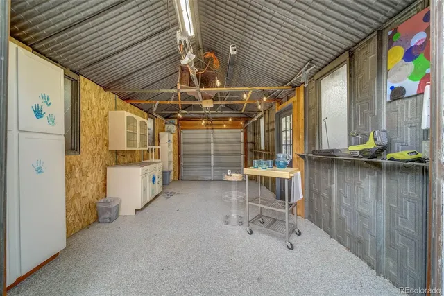 a view of a chairs in the patio