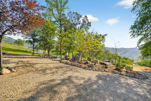 a view of a city with mountains in the background