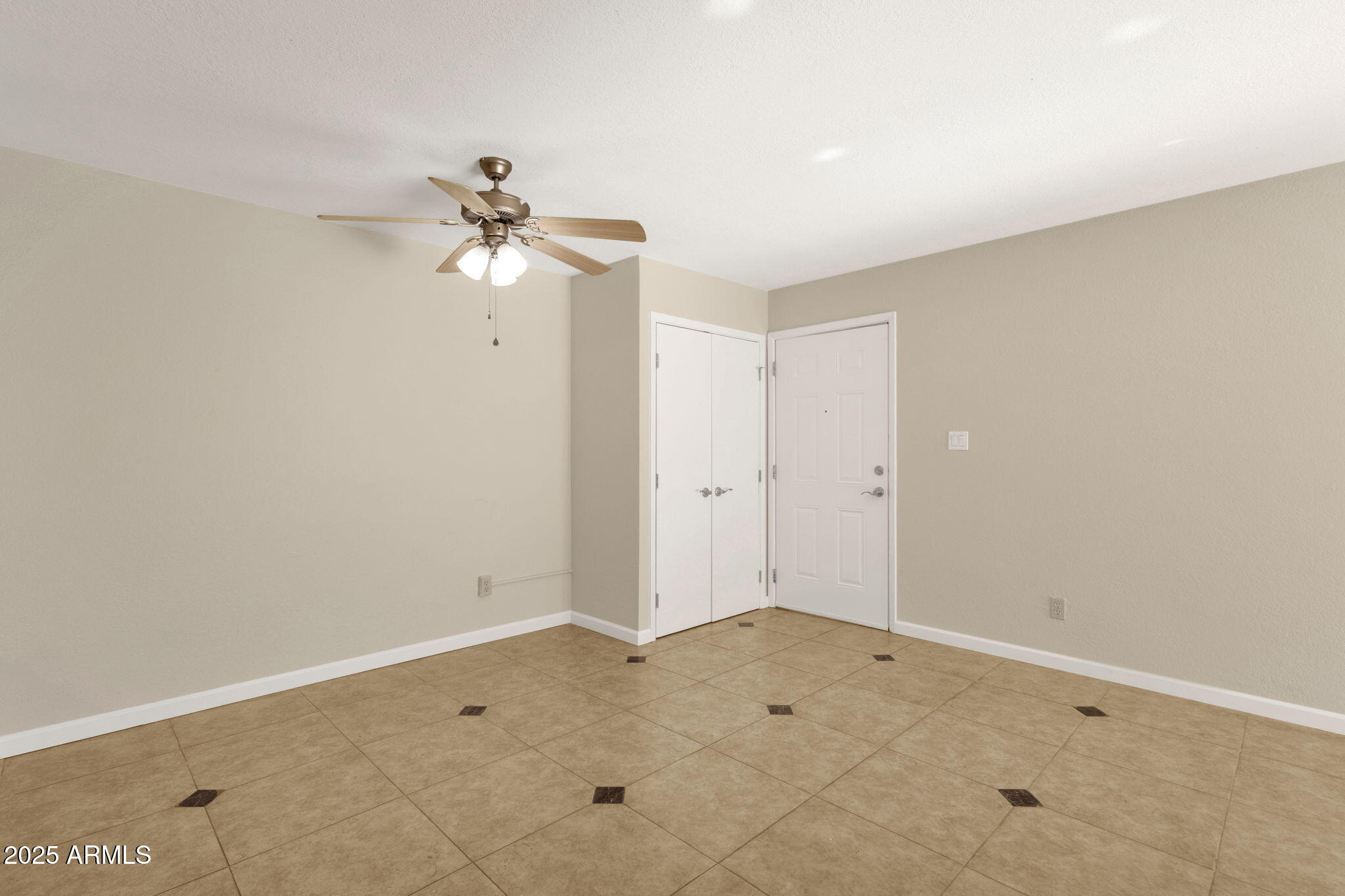3825 East Camelback Road, Unit 120 Phoenix, AZ 85018 - Photo 17 of 39 a view of a house with a ceiling fan and entryway
