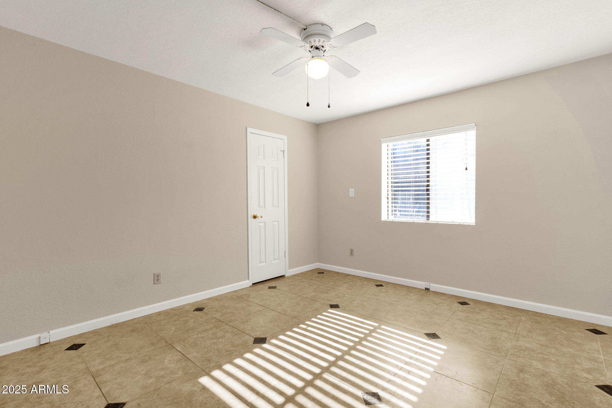3825 East Camelback Road, Unit 120 Phoenix, AZ 85018 - Photo 23 of 39 a view of a room with a window