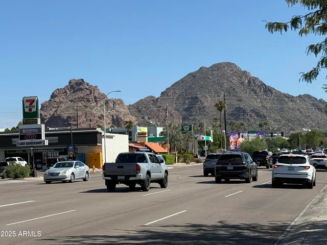 a view of a cars parked in front of a house