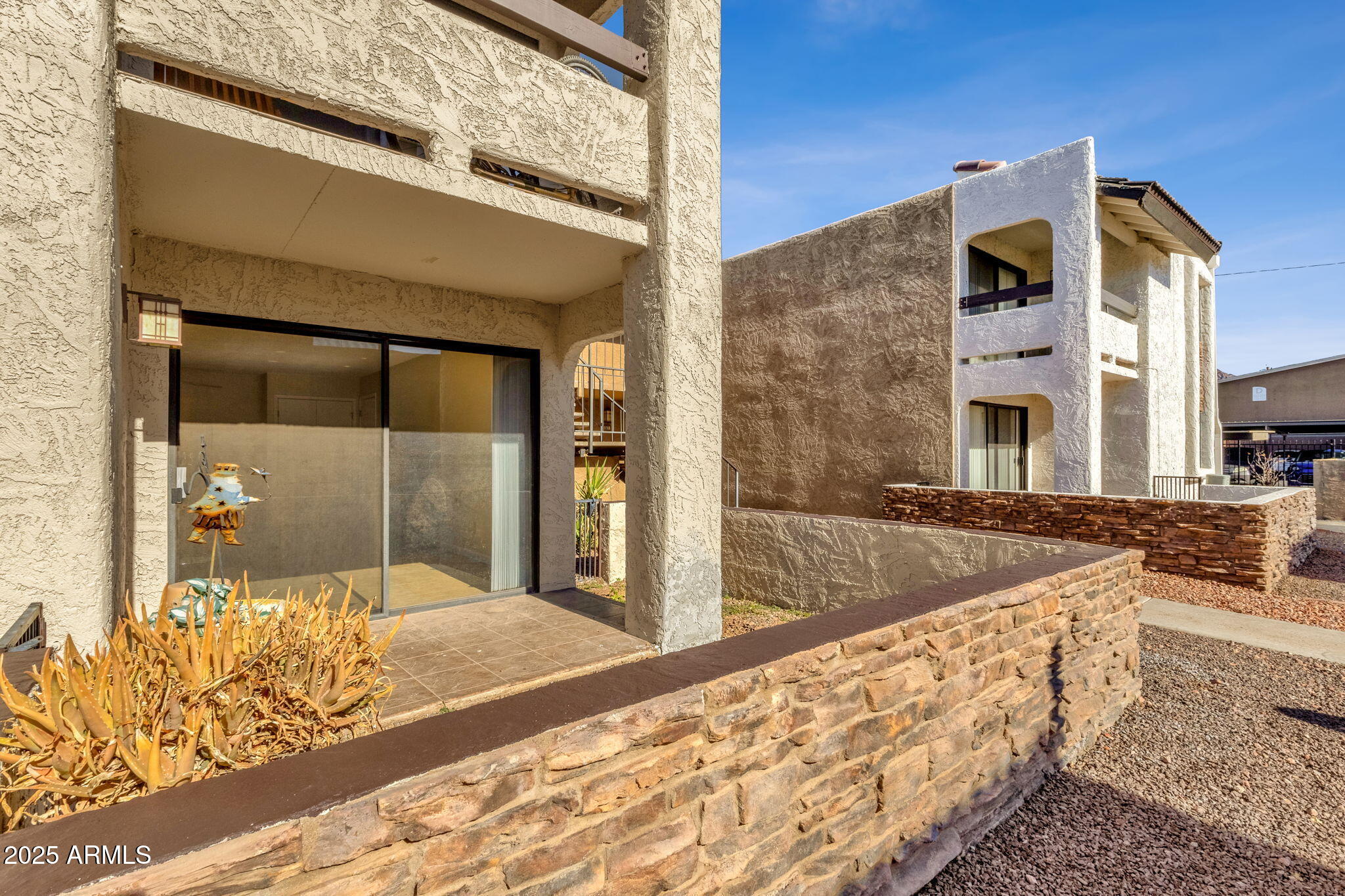 3825 East Camelback Road, Unit 120 Phoenix, AZ 85018 - Photo 32 of 39 a front view of a house